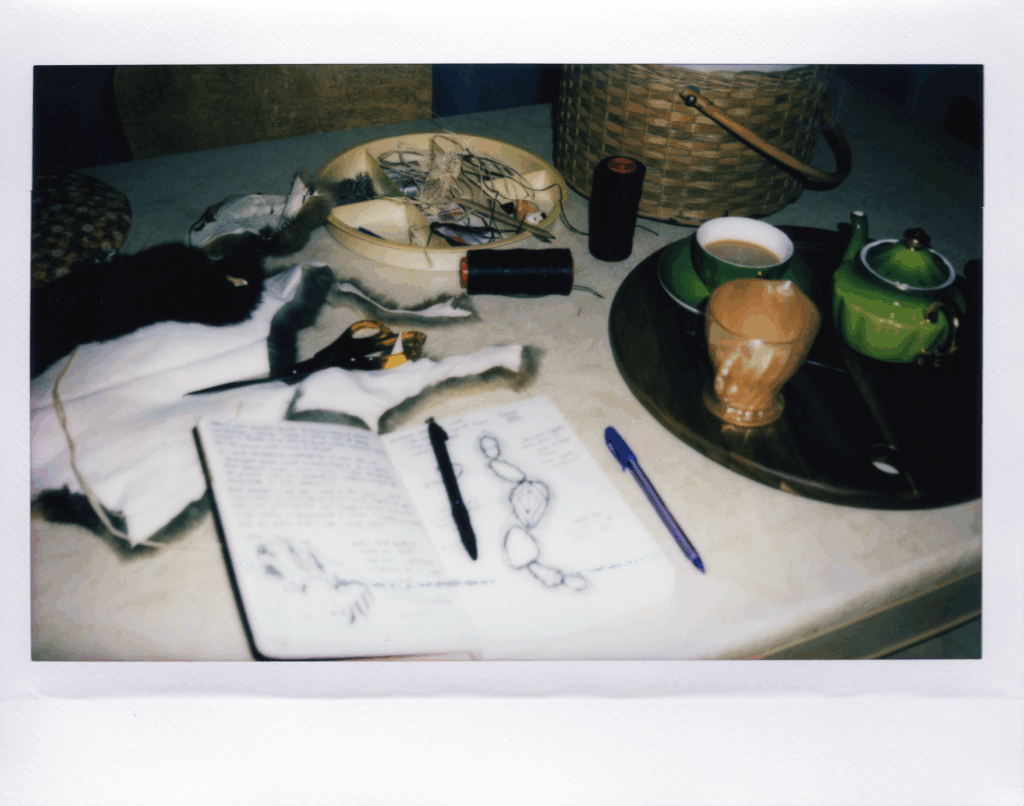 Tarryn Love, ﻿paleeteekort to carry on my shoulders, 2024, polaroid of making possum skin cloak resize